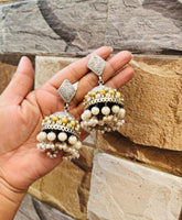 Antique-style gold oxidized jhumkas